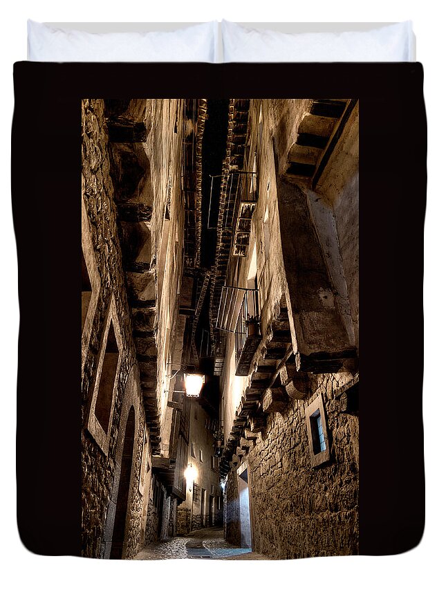 Narrow Street Duvet Cover featuring the photograph Narrow street in Albarracin by Weston Westmoreland