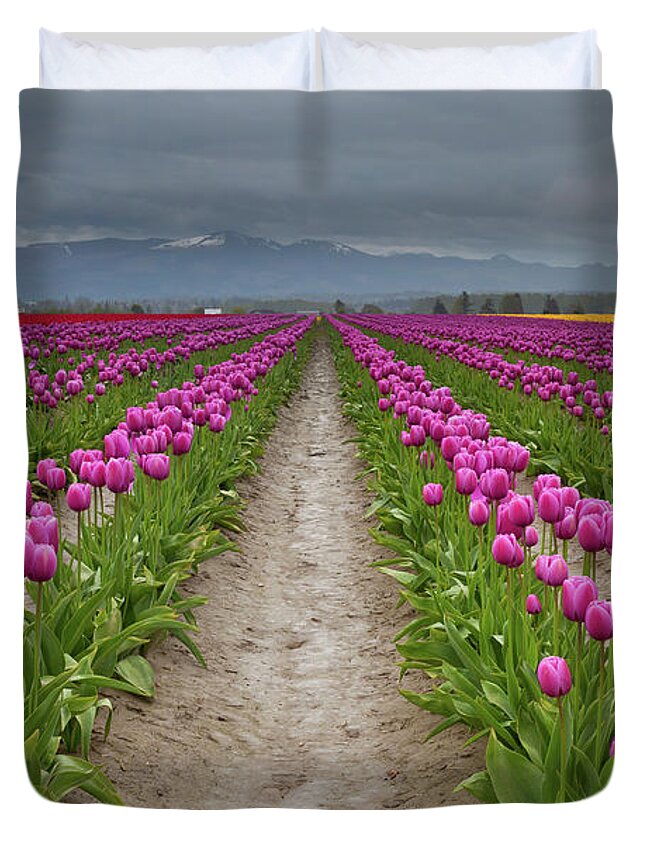 In A Row Duvet Cover featuring the photograph Tulips Festival by Helminadia