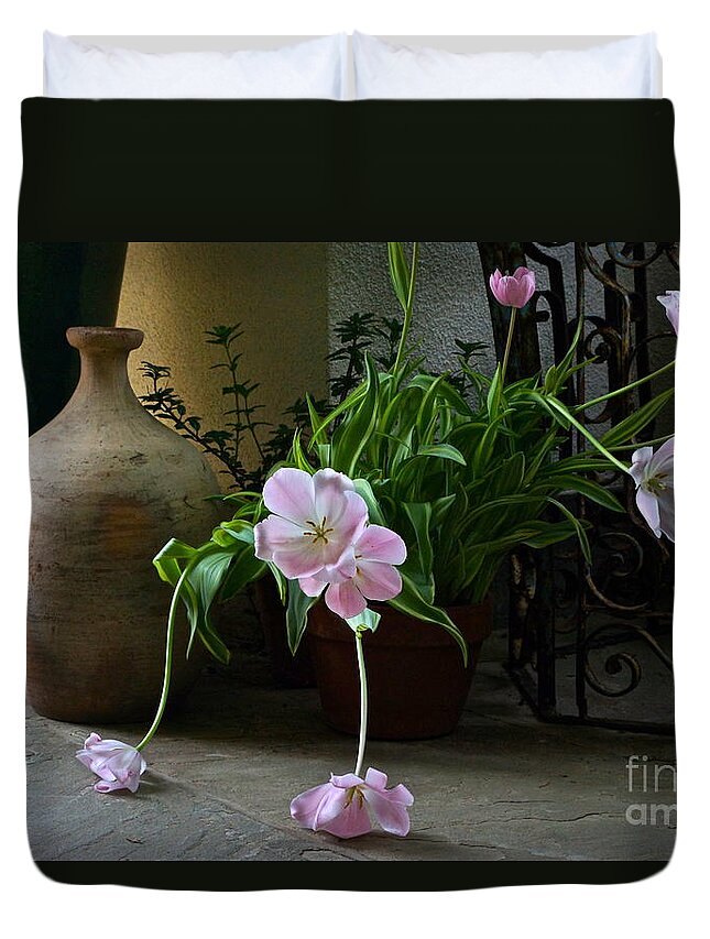 Tulip Still Life Duvet Cover featuring the photograph Tulips with Earthenware Jar and Wrought Iron by Byron Varvarigos