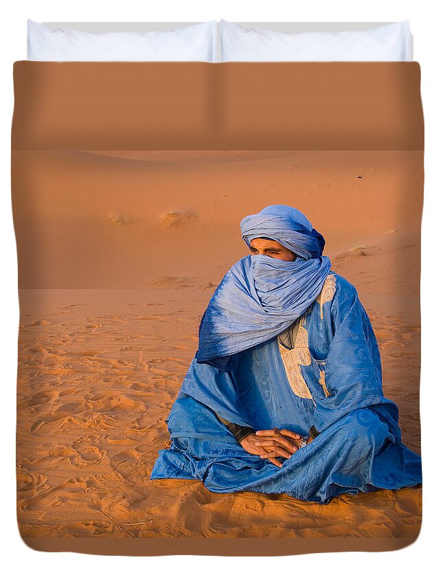 Photography Duvet Cover featuring the photograph Veiled Tuareg Man Sitting Cross-legged by Panoramic Images