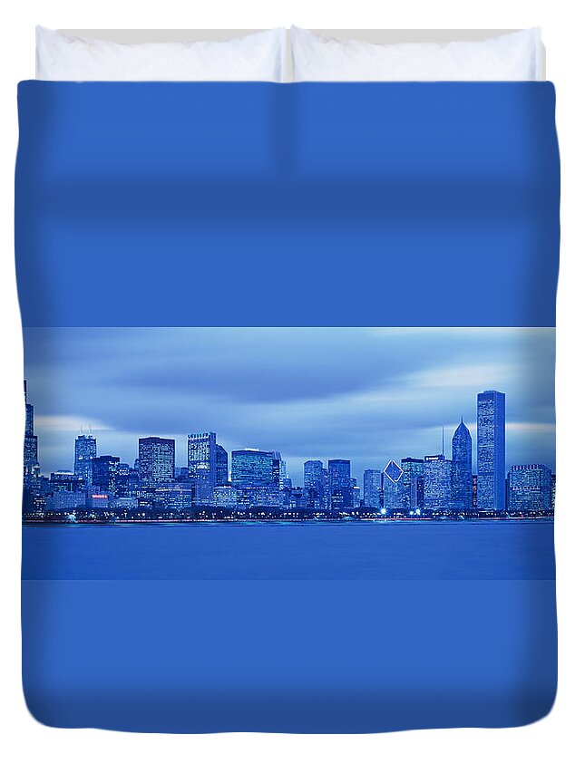 Photography Duvet Cover featuring the photograph View Of An Urban Skyline At Dusk by Panoramic Images