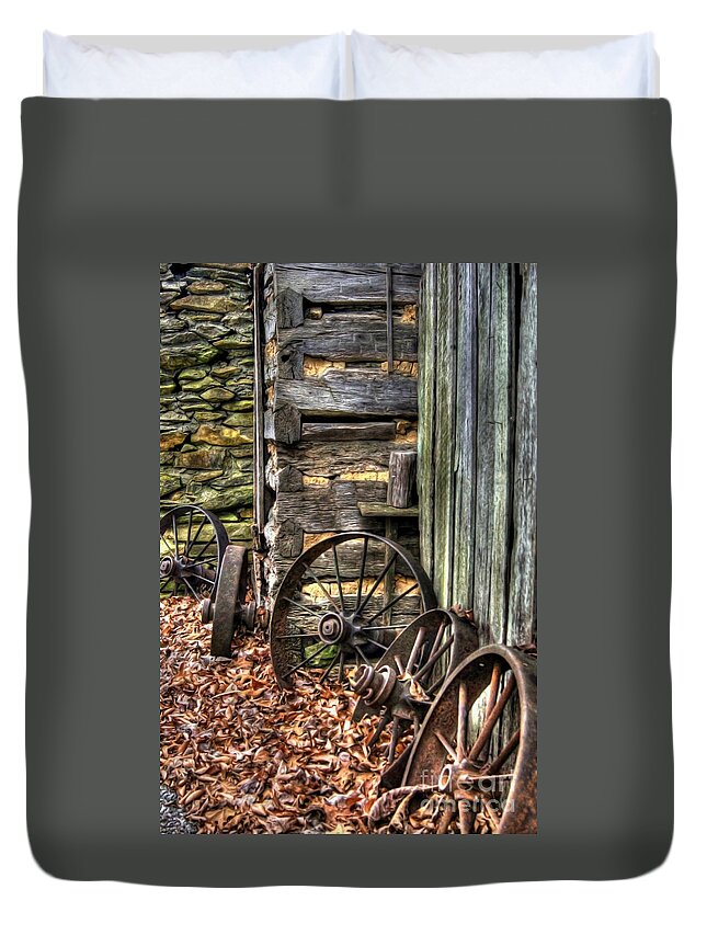Wagon Wheel Duvet Cover featuring the photograph Wheels of Time by Benanne Stiens