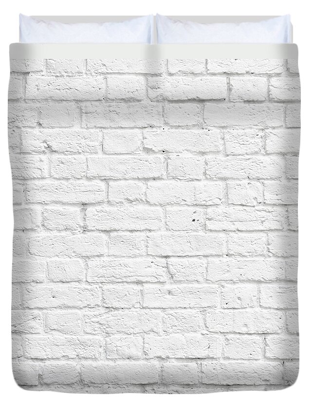 Brick Duvet Cover featuring the photograph White brick wall by Dutourdumonde Photography