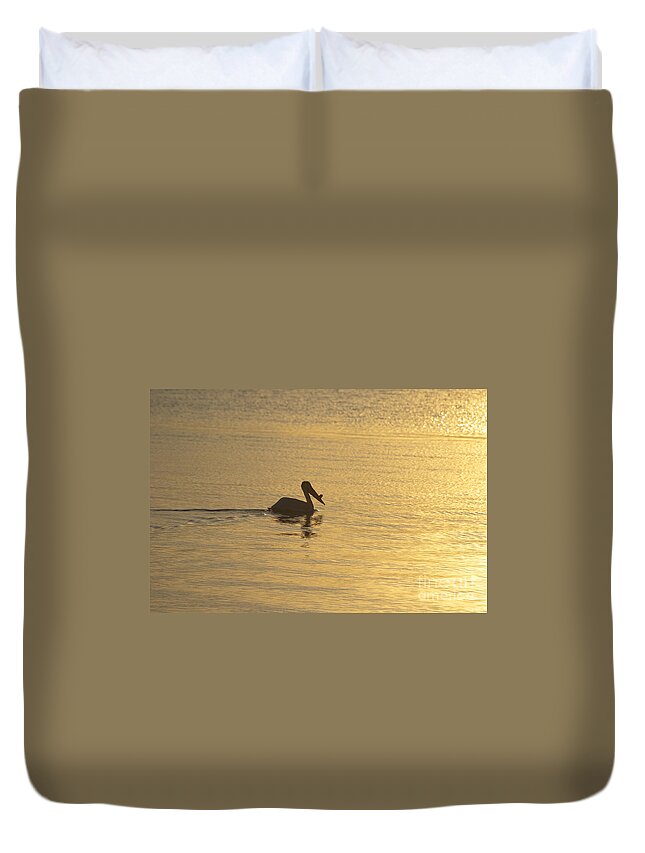 White Duvet Cover featuring the photograph White Pelican on Golden Lake by Joan Wallner