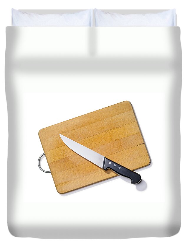 Above Duvet Cover featuring the photograph Wooden Cutting Board with Kitchen Knife by Alain De Maximy