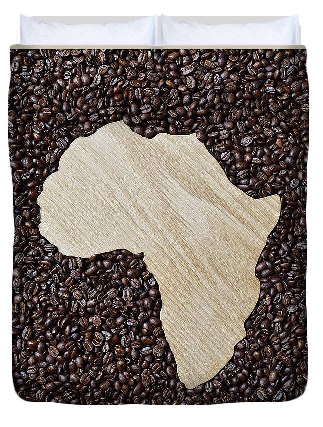 Heap Duvet Cover featuring the photograph Wooden Shape Of Africa Surrounded By by David Malan