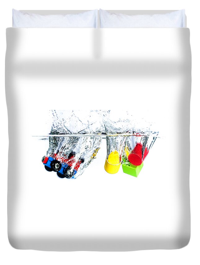 Toys Duvet Cover featuring the photograph Wooden toys in water by Mike Santis