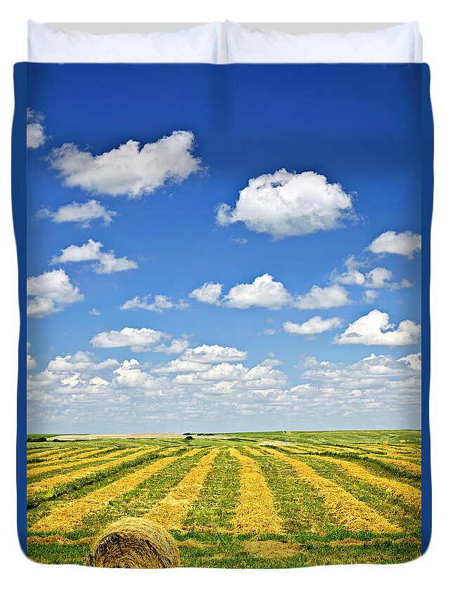 Agriculture Duvet Cover featuring the photograph Farm field at harvest in Saskatchewan 1 by Elena Elisseeva