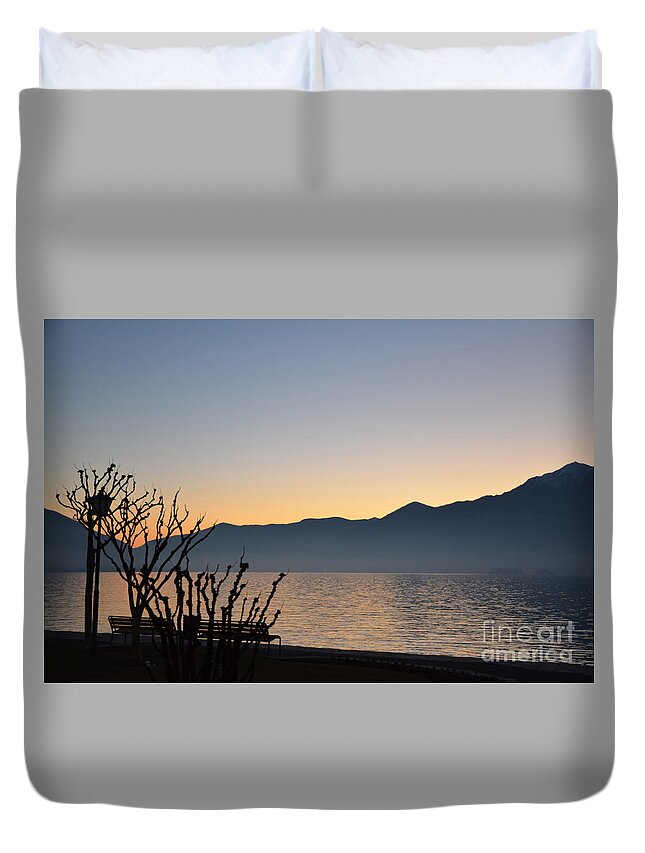 Blue Duvet Cover featuring the photograph Sunset over an alpine lake #3 by Mats Silvan