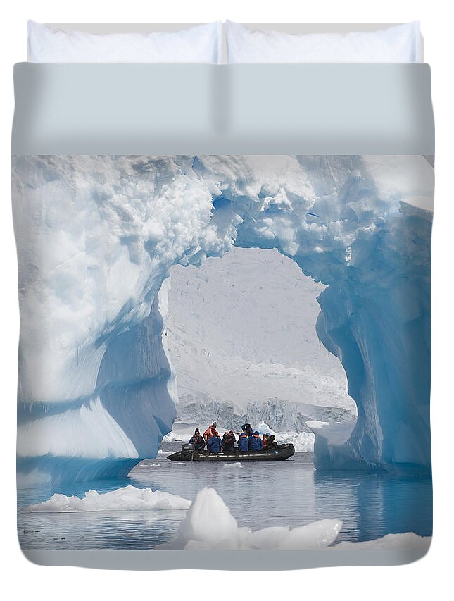 Adventure Duvet Cover featuring the photograph Iceberg Arch and Travelers Antarctica by Flip Nicklin