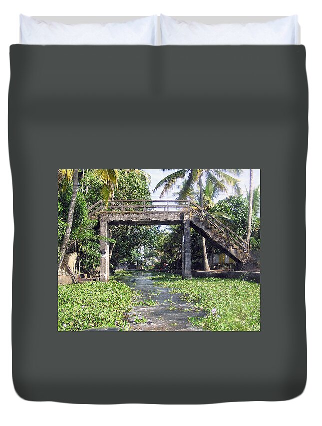 Alleppey Duvet Cover featuring the photograph An old stone bridge over a canal in Alleppey by Ashish Agarwal