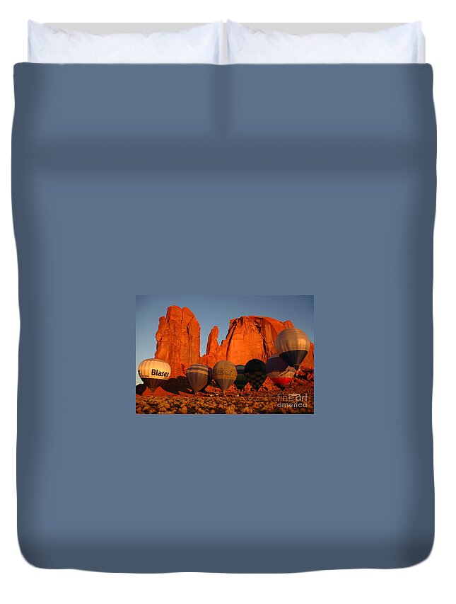 Hot Air Balloons Duvet Cover featuring the photograph Dawn Flight in Monument Valley by Vivian Christopher