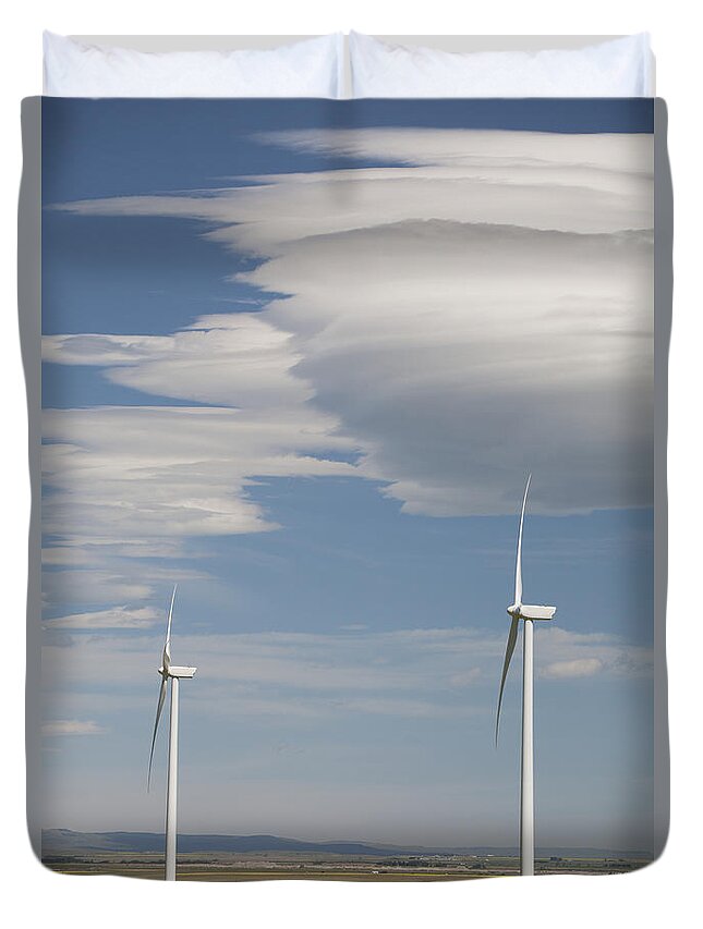 Alberta Duvet Cover featuring the photograph Dramatic Clouds With Blue Sky And by Michael Interisano