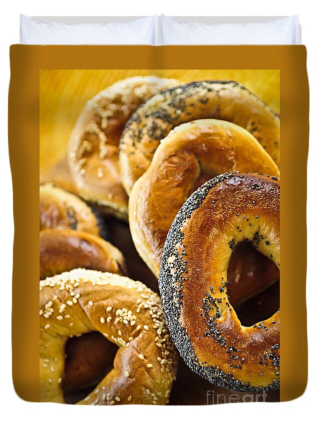 Bagel Duvet Cover featuring the photograph Fresh bagels by Elena Elisseeva