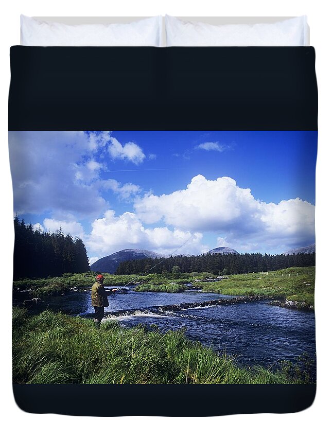 Co Galway Duvet Cover featuring the photograph Side Profile Of A Man Fly-fishing In A by The Irish Image Collection 