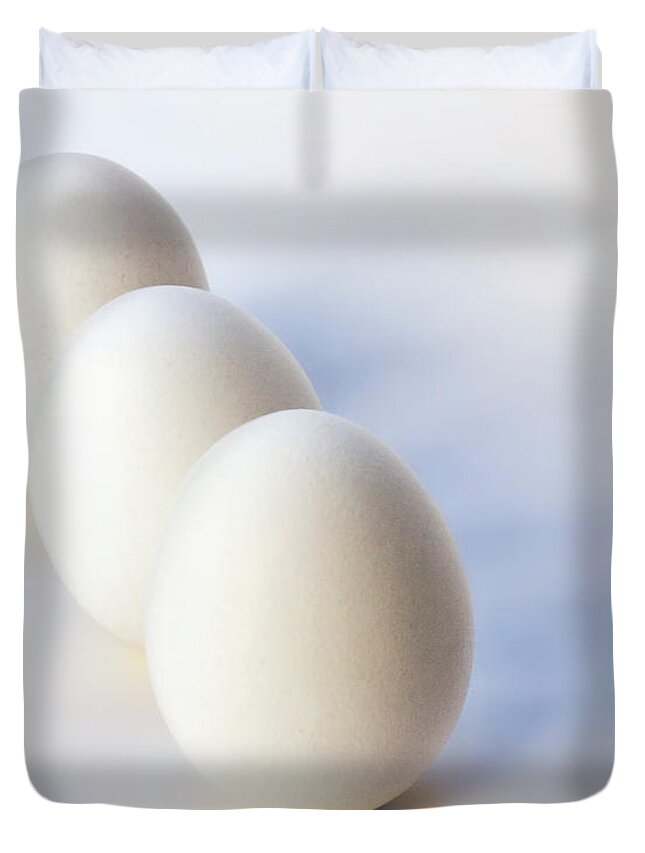 Endre Duvet Cover featuring the photograph Three Eggs In a Row by Endre Balogh