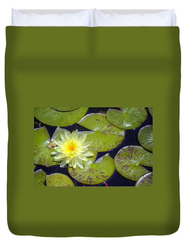 Flower Duvet Cover featuring the photograph Yellow Waterlily by Joan Carroll