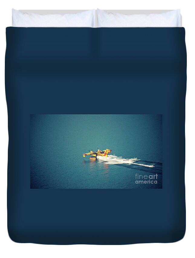 Aerospace Duvet Cover featuring the photograph Aircraft firefighter take water in the sea #1 by Raimond Klavins