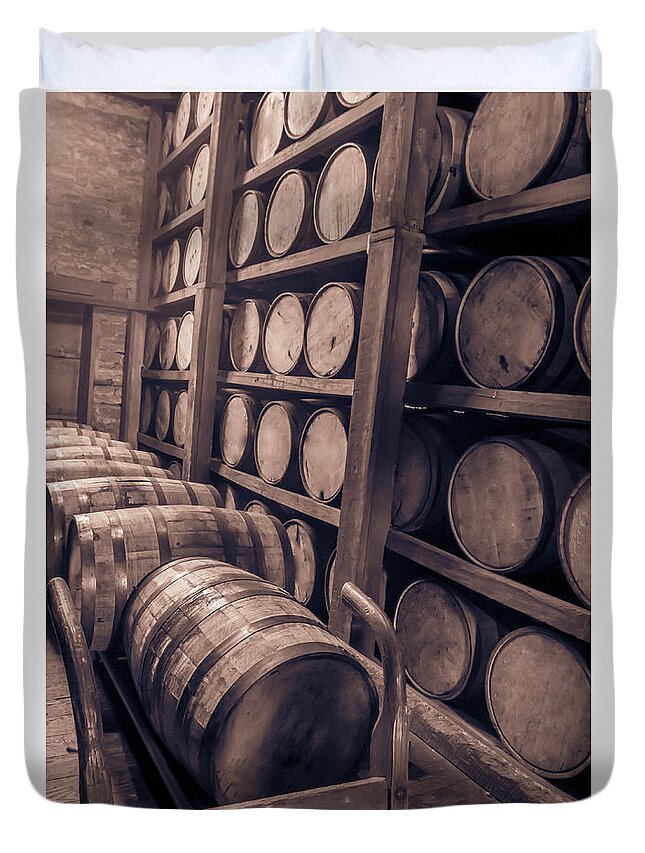 Aging. Age Duvet Cover featuring the photograph Oak barrels in RIk house #1 by Karen Foley