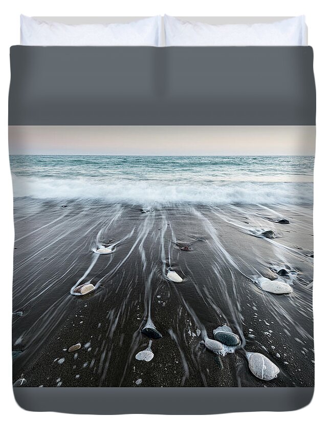 Seascape Duvet Cover featuring the photograph Pebbles in the beach and flowing sea water by Michalakis Ppalis