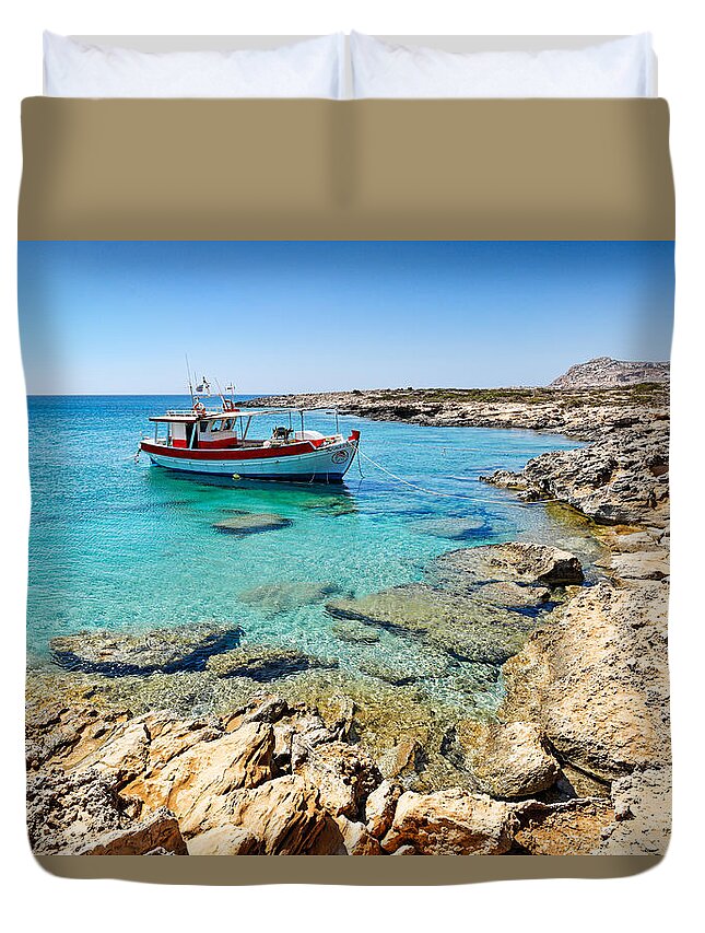 Diakofti Duvet Cover featuring the photograph A fishing boat in Karpathos - Greece by Constantinos Iliopoulos