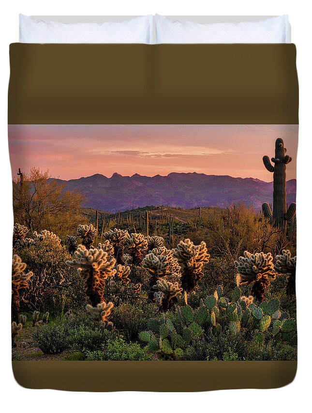 Saguaro Sunset Duvet Cover featuring the photograph A Pink Kissed Sunset by Saija Lehtonen