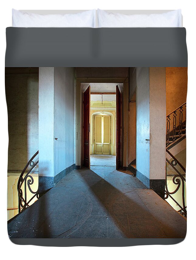 Castle Duvet Cover featuring the photograph A play of light on ythe stairway by Dirk Ercken