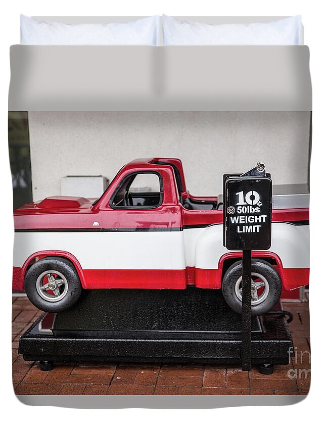 Toys Duvet Cover featuring the photograph A Ten Cent Ride by Lynn Sprowl