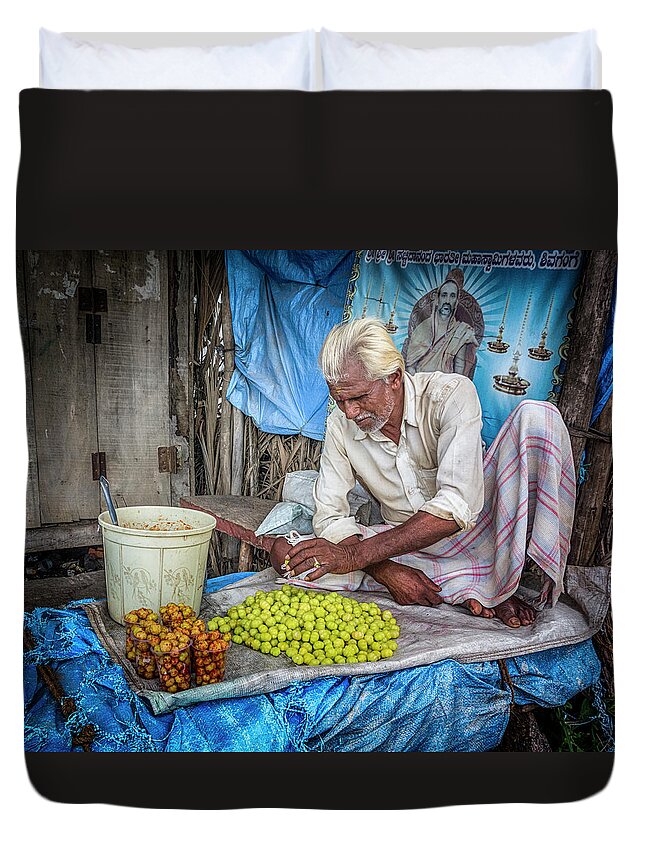 Asia Duvet Cover featuring the photograph A vendor. by Usha Peddamatham