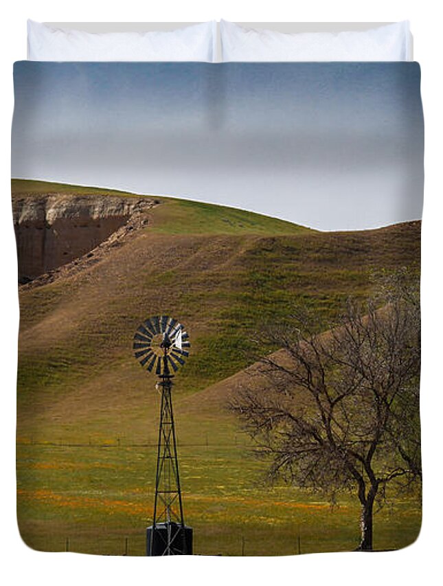Windmill Duvet Cover featuring the photograph A Windmill and Wildflowers by Roger Mullenhour