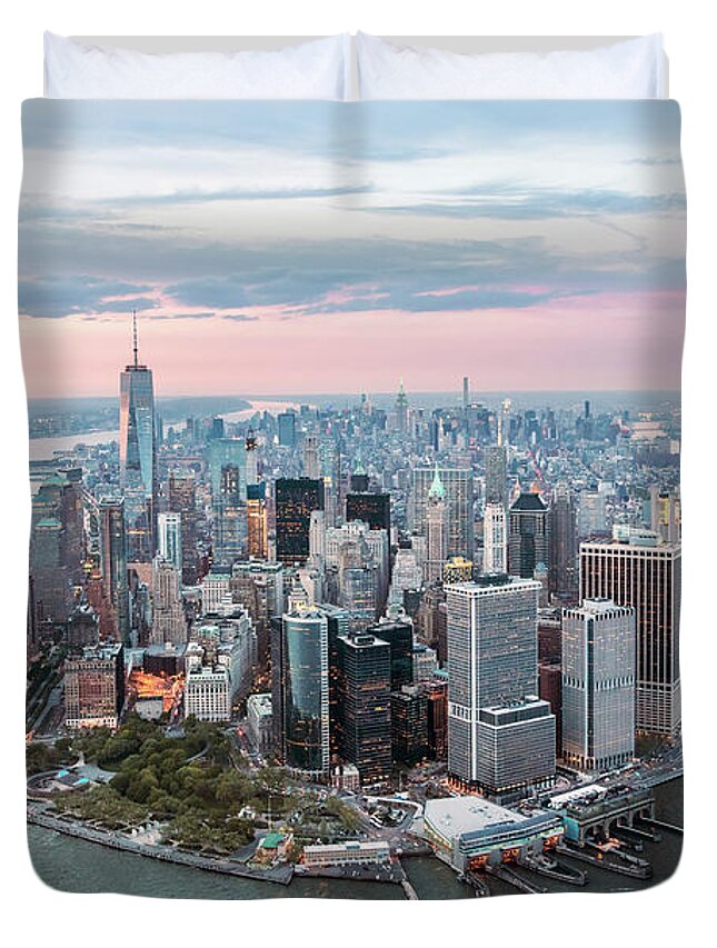 New York City Duvet Cover featuring the photograph Aerial of lower Manhattan peninsula at sunset, New York, USA by Matteo Colombo