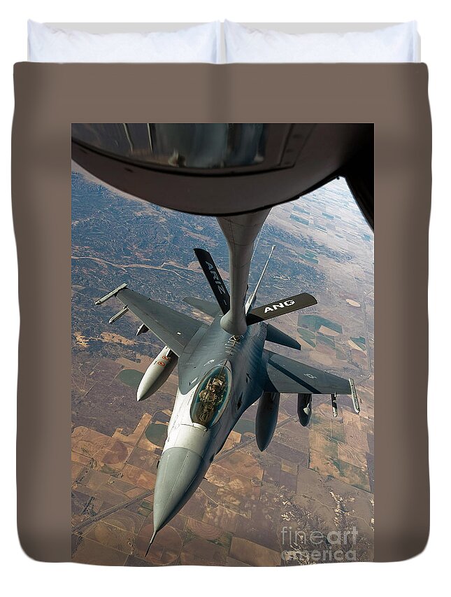 Air-to-air Duvet Cover featuring the photograph An F-16 Fighting Falcon Receiving Fuel by Stocktrek Images