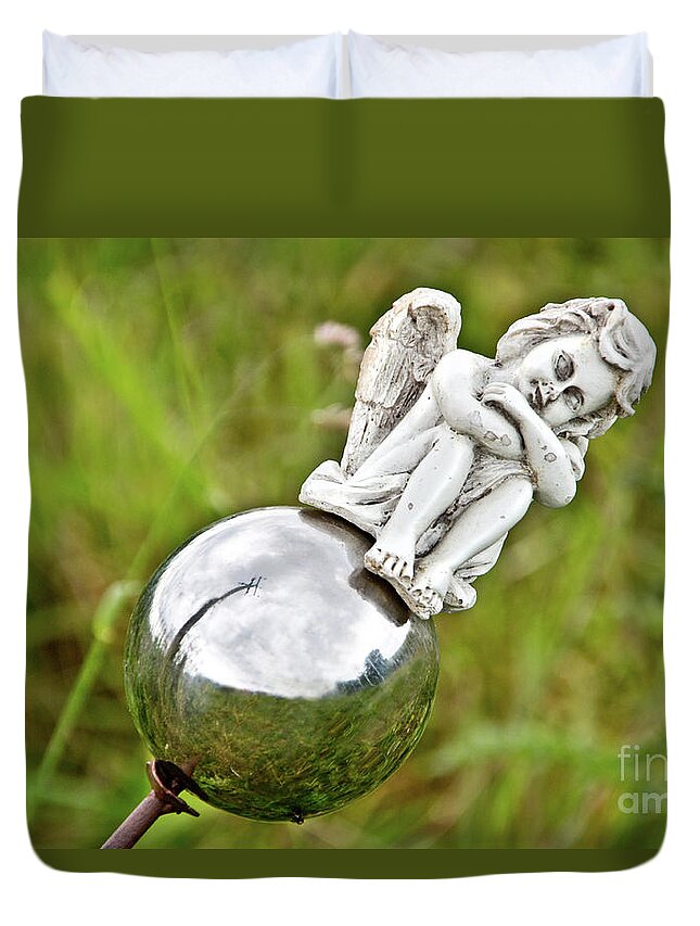 Photograph Duvet Cover featuring the photograph Angel on her Silver Ball by Adriana Zoon
