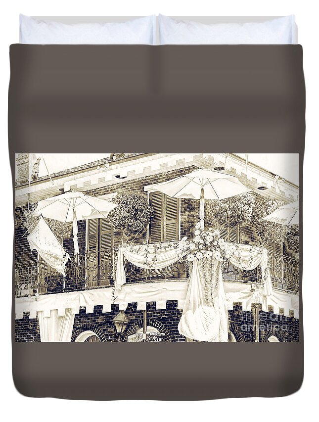 New Orleans Duvet Cover featuring the photograph At The Corner of Bourbon and ST Ann Black and White by Frances Ann Hattier