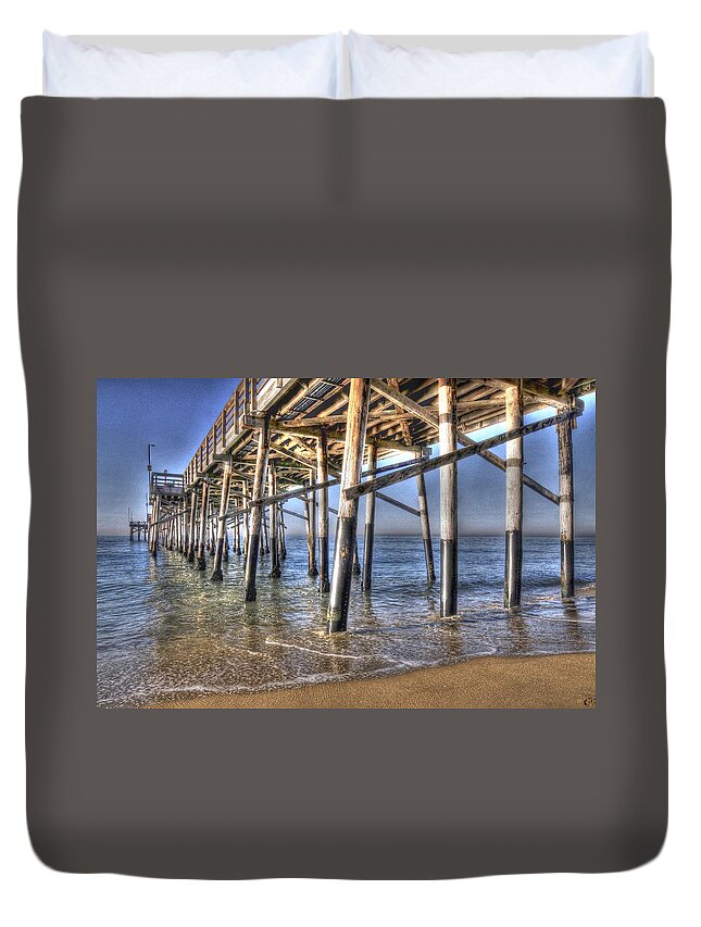 Pier Duvet Cover featuring the photograph Balboa Pier Pylons by Richard Omura