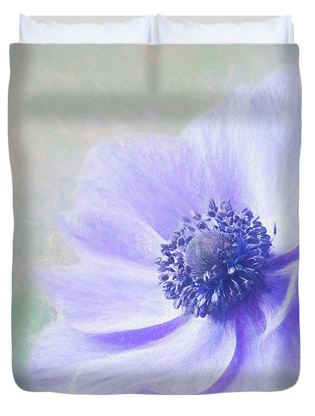 Flower Duvet Cover featuring the photograph Blowing in the wind-windflower. by Usha Peddamatham