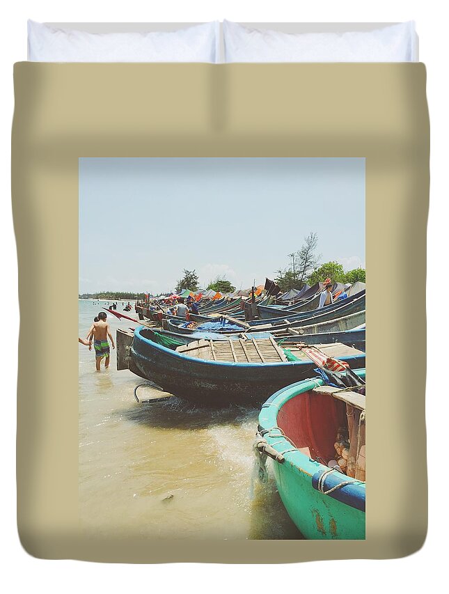 Boats Duvet Cover featuring the photograph Boats at sea by Nancy Truong