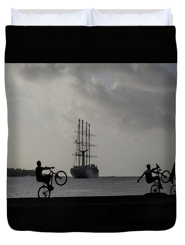 Silhouette Duvet Cover featuring the photograph Boys at play by Sharon Jones