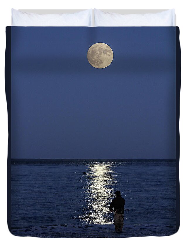 Fishing Duvet Cover featuring the photograph By the light of the Supermoon by John Loreaux