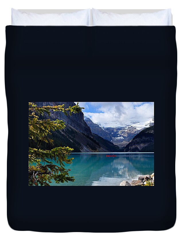Lake Louise Duvet Cover featuring the photograph Canoe on Lake Louise by Larry Ricker