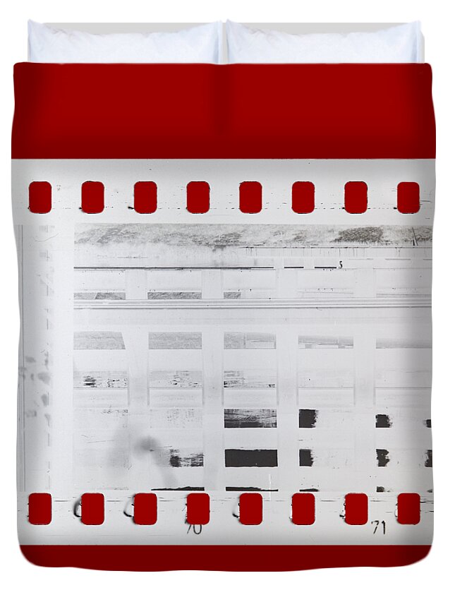 Film Duvet Cover featuring the photograph Celluloid film by Michal Boubin