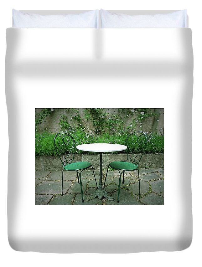 Chair Duvet Cover featuring the photograph Chairs and table in a magic summer garden by GoodMood Art