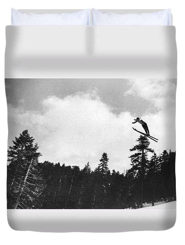1 Person Duvet Cover featuring the photograph Champion Ski Jumper by Underwood Archives