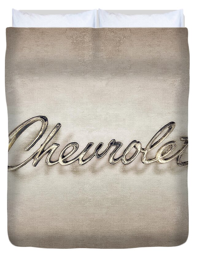 Automotive Duvet Cover featuring the photograph Chevrolet Emblem by YoPedro