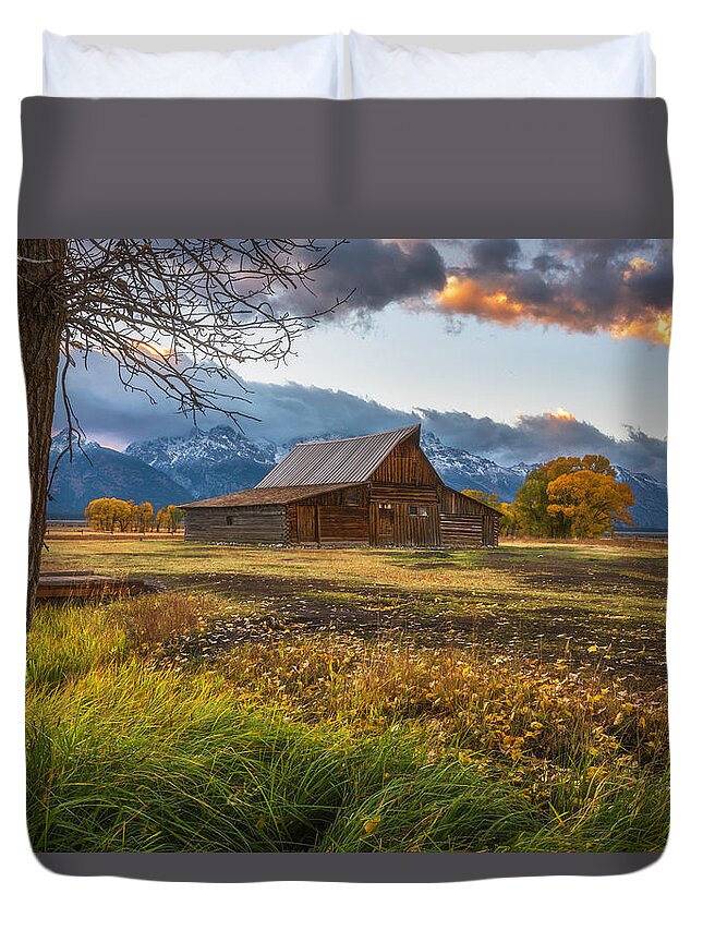 Sunset Duvet Cover featuring the photograph Clearing Storm over Moulton Barn by Darren White