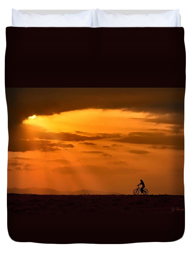Sun Duvet Cover featuring the photograph Cycling Into Sunrays by Joe Bonita