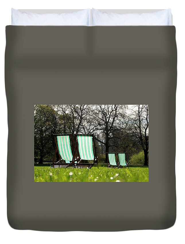 Garden Duvet Cover featuring the photograph Deck chairs in a park by Dutourdumonde Photography