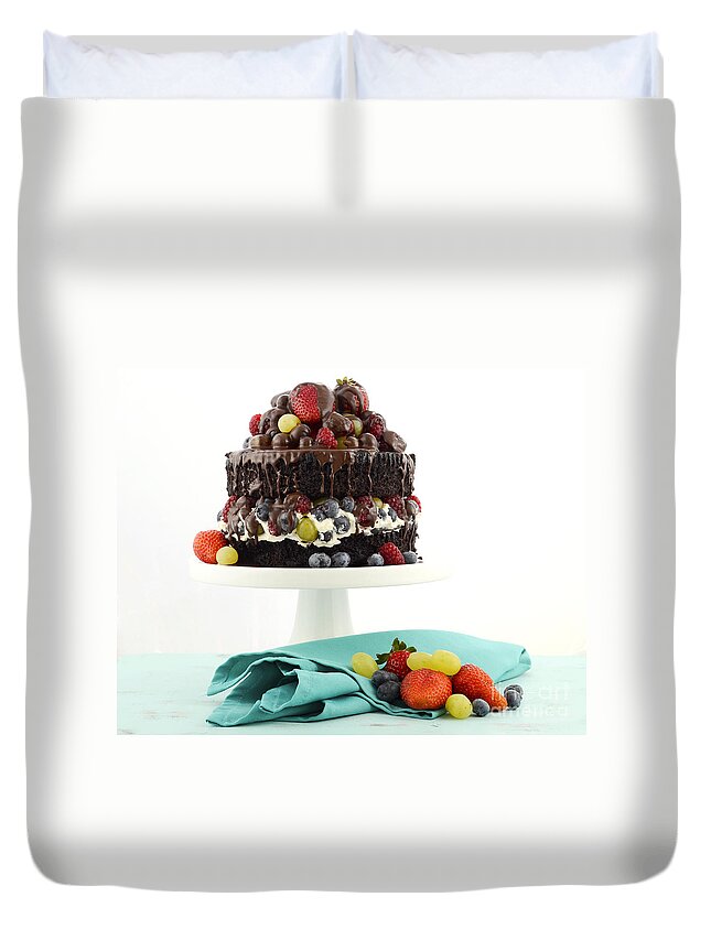 Aqua Duvet Cover featuring the photograph Deliciously divine chocolate cake with berries and cream. by Milleflore Images