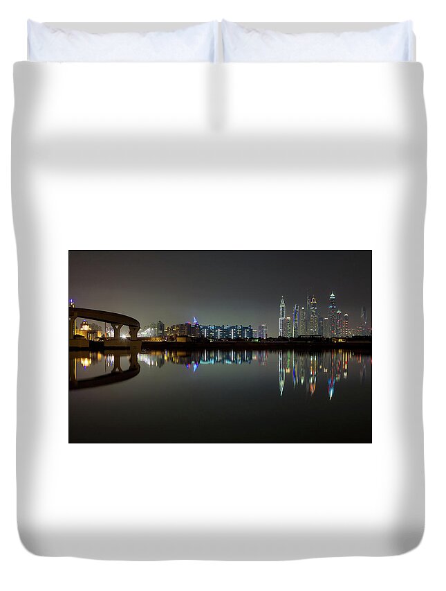 Dubai Duvet Cover featuring the photograph Dubai city skyline night time reflection by Andy Myatt