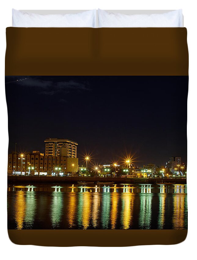 Emirates Duvet Cover featuring the photograph Dubai Creek by Night with the plane by Jouko Lehto